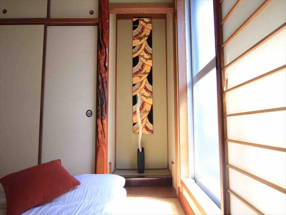 Goraku Shinfu-Kae Apartment Osaka Exterior foto